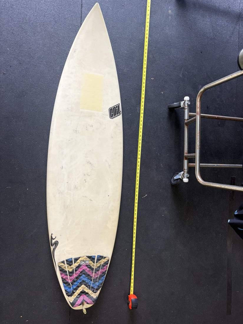 Coil Industries · 5'11" — Deck (measuring tape on right)