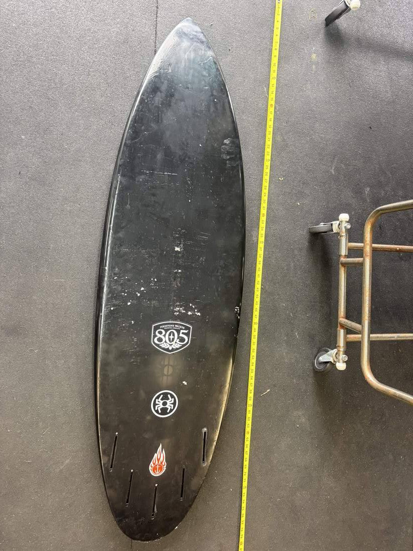 Spyder Surf · 5'11" — Bottom (measuring tape on right)