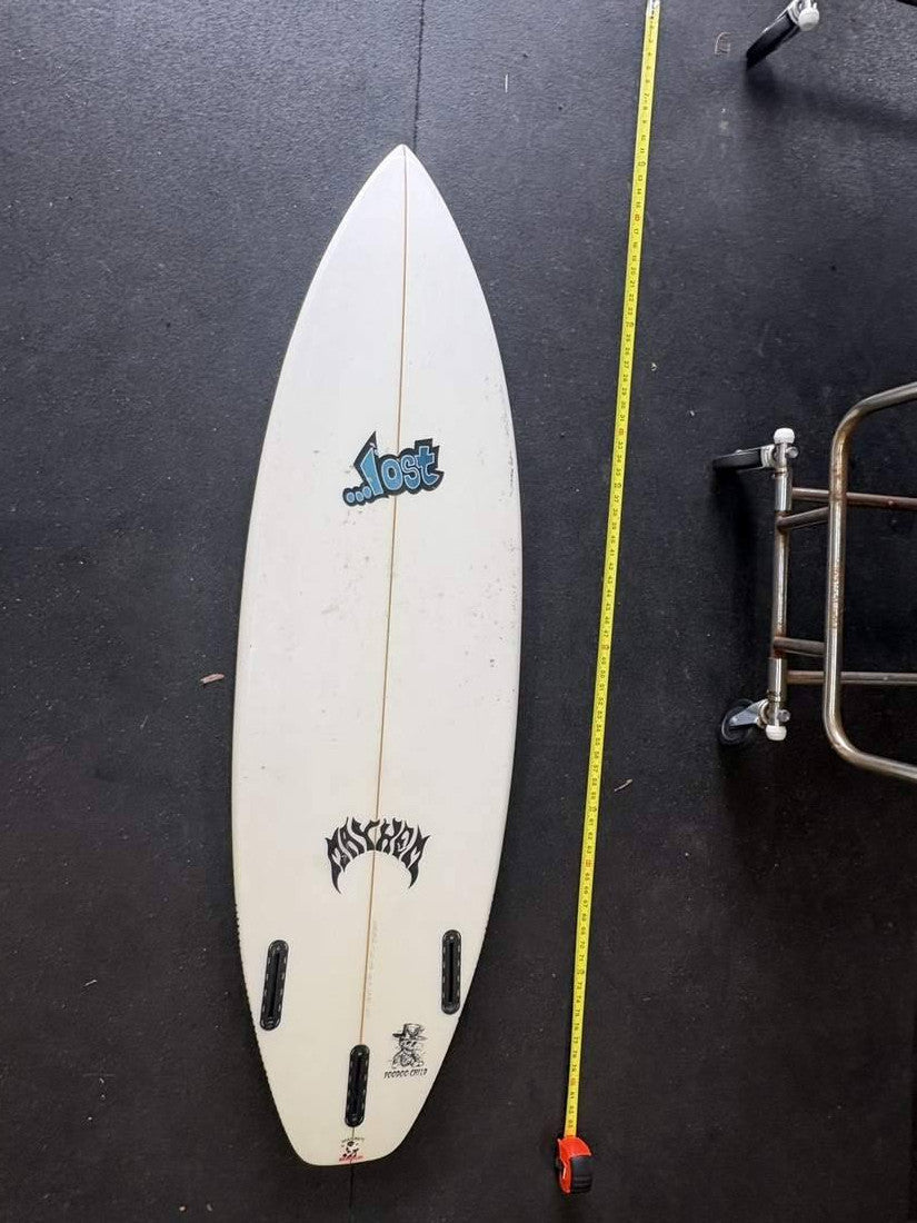 Lost · 5' 9" — Bottom nose up, tape right