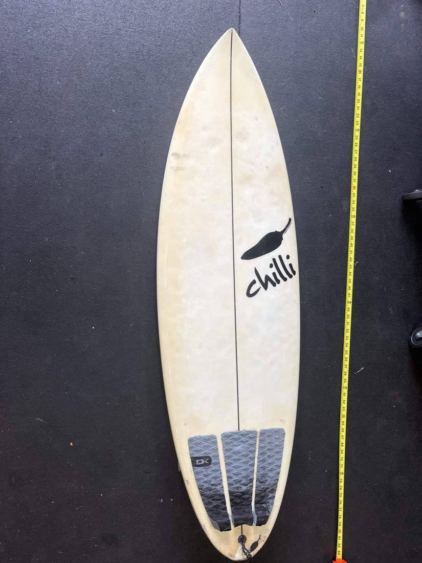Chilli · 5'4" — Deck; nose up and tape on right