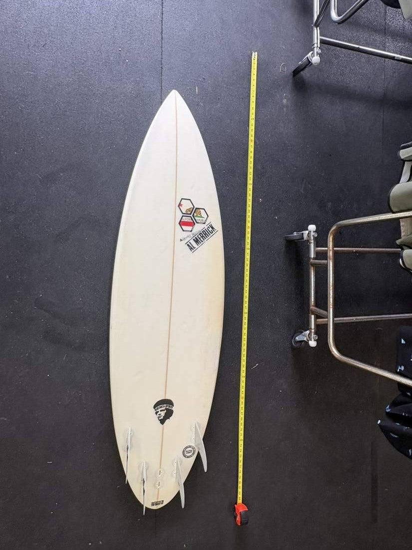 Channel Islands · 6'2" Bottom; nose up; yellow tape right