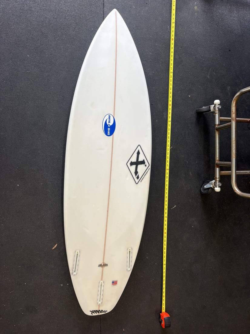 Xanadu · 5' 9" Bottom; nose up; yellow tape right