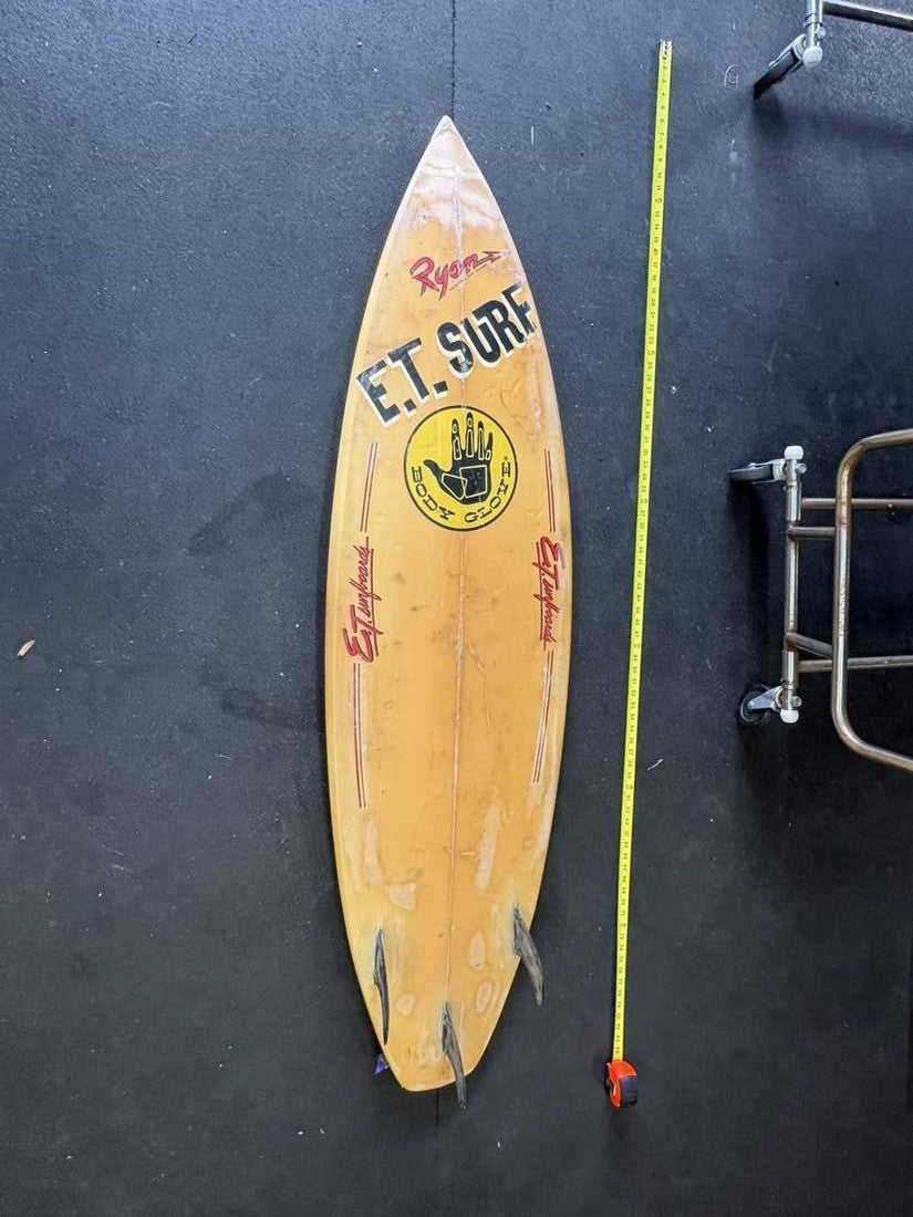 E.T. Surf · 6' 2" Bottom, nose up and yellow tape right