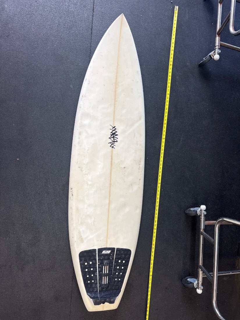 Scribbles 2 · 5' 9" — Deck, nose up and tape on right
