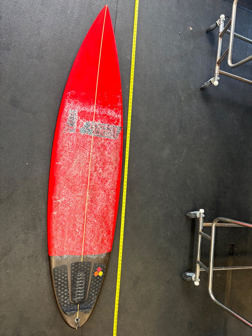 Al Merrick · 6' 10" — Deck, nose up and tape on right