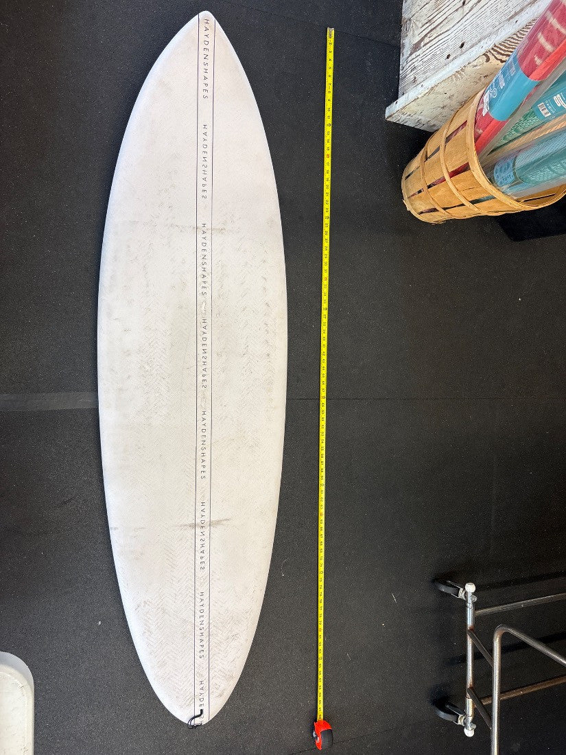 Hayden Shapes · 6' 11" — Deck, nose up and tape on right